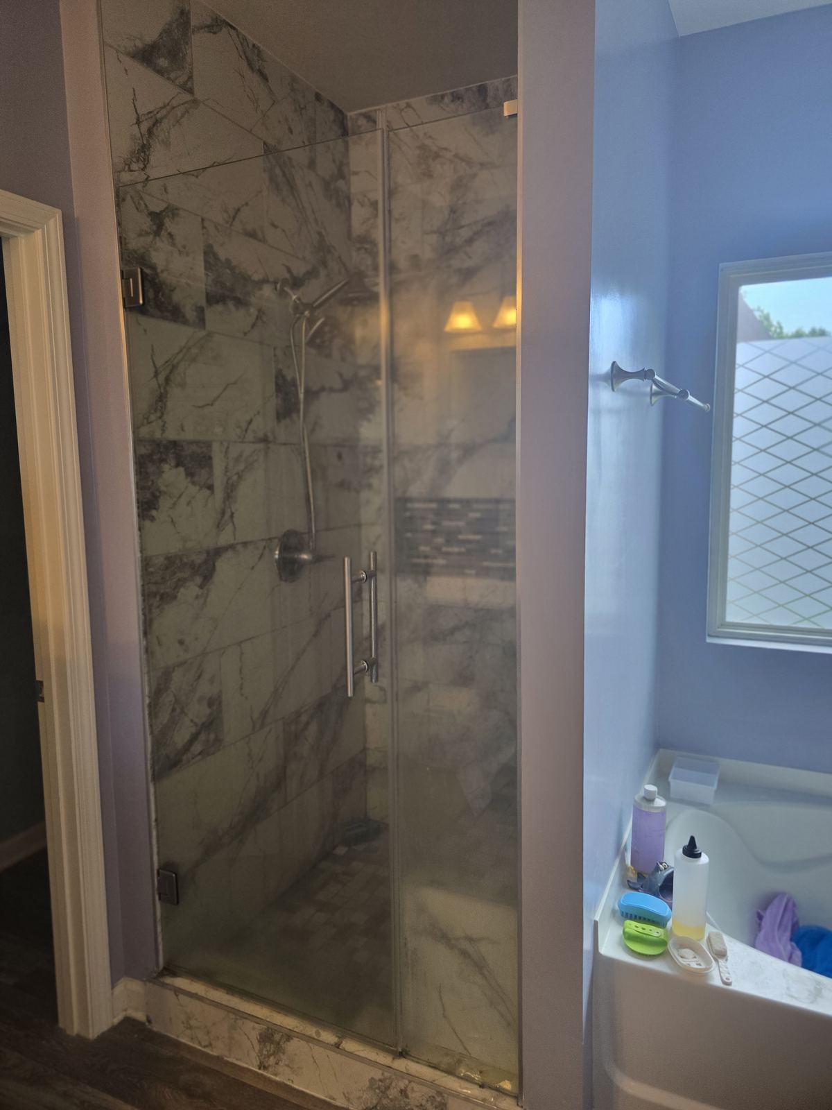 Before — existing bath. FusionFlow Showers install by Joshua Waldrep.