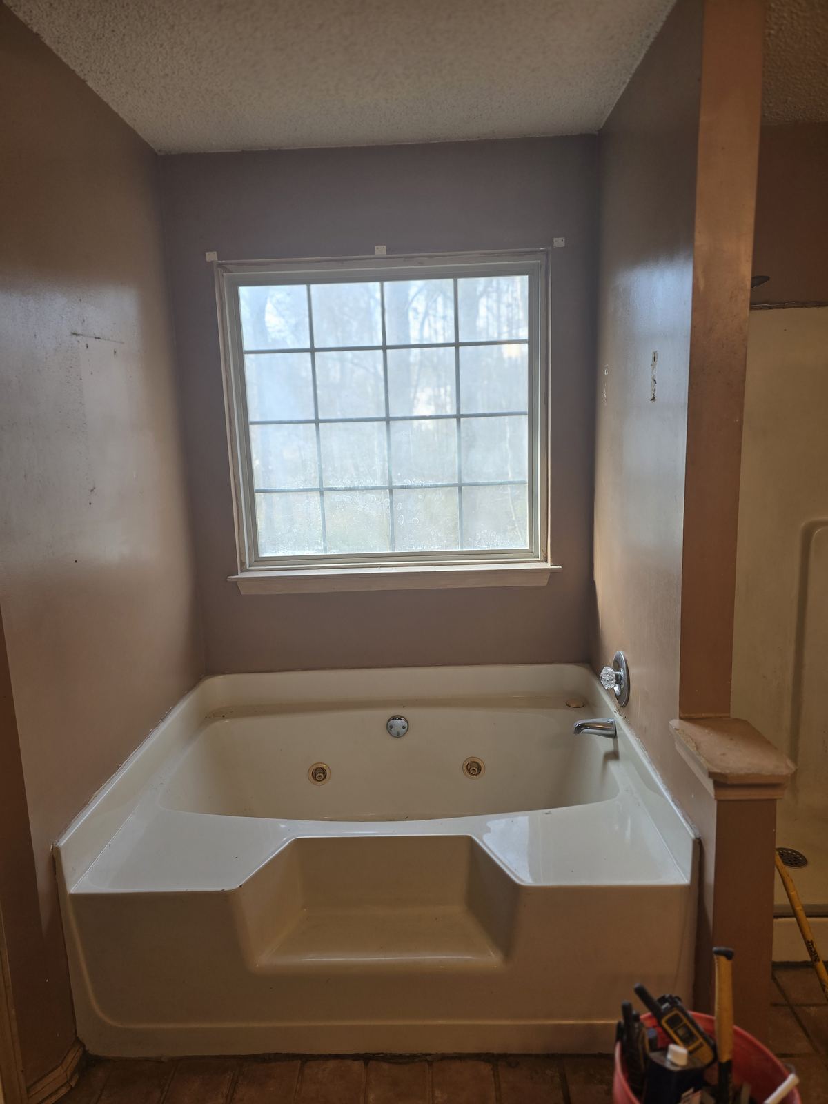 Before — existing bath. FusionFlow Showers install by Joshua Waldrep.